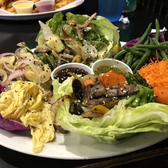 Bleu Monkey Grill - Chicken wrap appetizer made with veggies instead of chicken - Bars Near Me - Hot Springs, Arkansas Bleu Monkey Grill - Chicken wrap appetizer made with veggies instead of chicken - Bars Near Me - Hot Springs, Arkansas