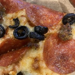 Domino's Pizza - Dried up olives and cheese was already hardened.