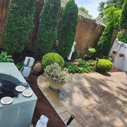 Angel's Landscaping - pruning shrubs and installing brown mulch