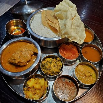 Anjappar Chettinad Restaurant - Mutton Thali - $16.99 | A sumptuous meal of rice and chappathi with sambar, kootu, poriyal, rasam, curd, pickle, pappadam and mutton masala. - Indian Near Me - Scarborough, Ontario Anjappar Chettinad Restaurant - Mutton Thali - $16.99 | A sumptuous meal of rice and chappathi with sambar, kootu, poriyal, rasam, curd, pickle, pappadam and mutton masala. - Indian Near Me - Scarborough, Ontario