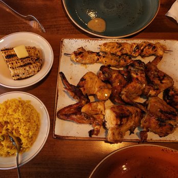 Barcelos Flame Grilled Chicken - Half pack- Half chicken, 2 kebabs, 4 wings, and 2 sides (rice and corn) - Portuguese Near Me - Burnaby, British Columbia