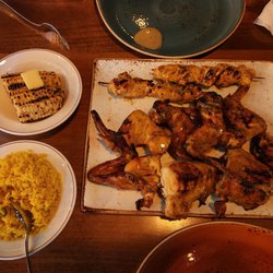 Half pack- Half chicken, 2 kebabs, 4 wings, and 2 sides (rice and corn)