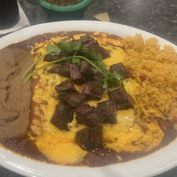 Martha’s Mexican Restaurant - Plain cheese enchiladas with beef fajitas. - Tex-Mex Near Me - Tomball, Texas Martha’s Mexican Restaurant - Plain cheese enchiladas with beef fajitas. - Tex-Mex Near Me - Tomball, Texas
