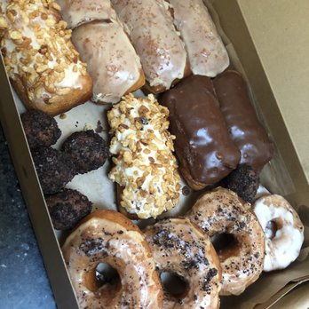 Raised Doughnuts and Cakes - Caramel crunch (not caramely or crunchy), best maple, Choc bars, tasty Oreo holes, white rabbit mochi, and Vietnamese coffee. - Donuts Near Me - Seattle, Washington Raised Doughnuts and Cakes - Caramel crunch (not caramely or crunchy), best maple, Choc bars, tasty Oreo holes, white rabbit mochi, and Vietnamese coffee. - Donuts Near Me - Seattle, Washington
