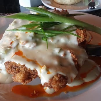 Cheever's Cafe - Chicken fried steak with jalapeño gravy over red mashed potatoes. - New American Near Me - Oklahoma City, Oklahoma Cheever's Cafe - Chicken fried steak with jalapeño gravy over red mashed potatoes. - New American Near Me - Oklahoma City, Oklahoma