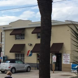 Amtrak - Greyhound office just across the parking lot from Kissimmee station. The sign says "mini market inside"- handy for travelers!