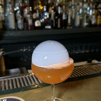 The Wurst - Peach Champagne Cocktail - Cocktail Bars Near Me - Baltimore, Maryland