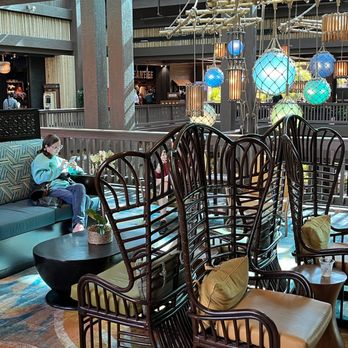 Tambu Lounge - You can take your Tambu Lounge drink, over to this seating area in the atrium lobby-January 2024. - Lounges Near Me - Lake Buena Vista, Florida Tambu Lounge - You can take your Tambu Lounge drink, over to this seating area in the atrium lobby-January 2024. - Lounges Near Me - Lake Buena Vista, Florida