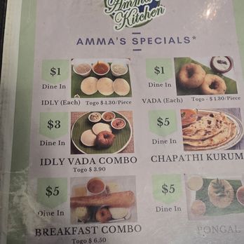 Amma's Kitchen - Menu - Menu from Amma's Kitchen in Edison, NJ, showing various South Indian dishes with prices. Items include idly, vada, vada combo, chapathi kurum, and breakfast combo, each with dine-in pricing. The menu features images of the dishes and highlights special combos and individual items, with prices ranging from $1 to $6. The menu is printed on paper inside a plastic cover, with some wear and tear visible. - Indian Near Me - Edison, New Jersey