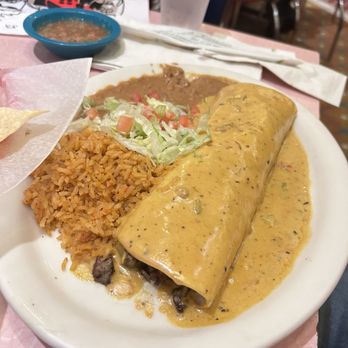 Chuy's - Steak burrito with queso on top - Bars Near Me - Pembroke Pines, Florida
