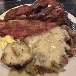 Breakfast buffet with sausage gravy on my potatoes. INCREDIBLE Breakfast buffet with sausage gravy on my potatoes. INCREDIBLE