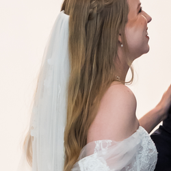 Makeup By Adrienn - Unedited, wedding day at ceremony. You can see the braid here but the waves are already falling out.