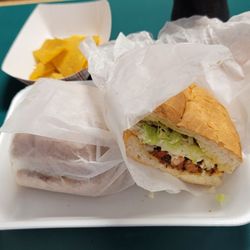 El Taquito - 9/15/23 Torta Pastor marinated pork beans, lettuce tomato, light sauce cheese. My way mild but yummy. Diet Coke.