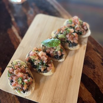 Santiago's Bodega - Tomato and Basil Bruschetta - Spanish Near Me - Altamonte Springs, Florida Santiago's Bodega - Tomato and Basil Bruschetta - Spanish Near Me - Altamonte Springs, Florida