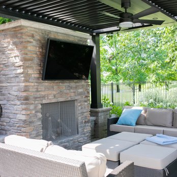 Executive Landscape - outdoor living area with fireplace and tv - Landscaping Near Me - Northville, Michigan Executive Landscape - outdoor living area with fireplace and tv - Landscaping Near Me - Northville, Michigan