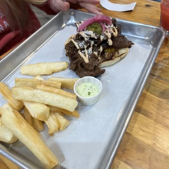 Cafe Racer Kitchen - a tray of fries and a steak sandwich - Food Trucks Near Me - Minneapolis, Minnesota