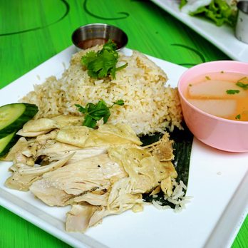 E-Jae Pak Mor - R1: Khao Mun Gai (Rice Cooked in Chicken Broth): Thai Hainanese style poached chicken over ginger and garlic rice ($14.95). - Thai Near Me - Seattle, Washington