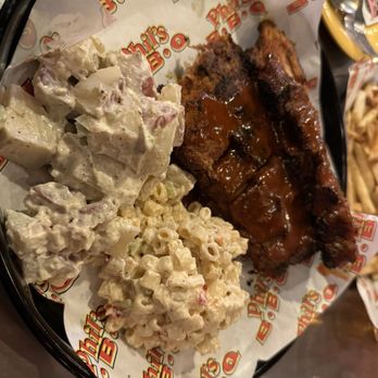 Phil's BBQ - Full rack of baby back ribs with potato salad and macaroni salad - Barbeque Near Me - San Diego, California
