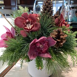 Beautiful floral arrangements throughout the store - delivered by a local florist Beautiful floral arrangements throughout the store - delivered by a local florist