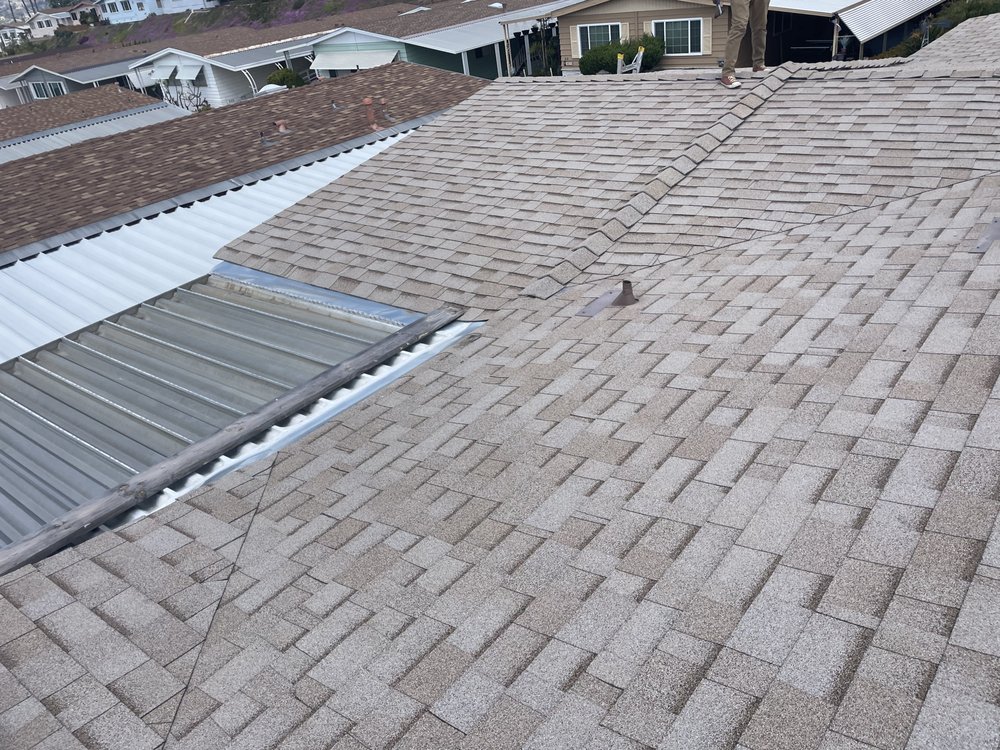 Slide of Balam Roofing