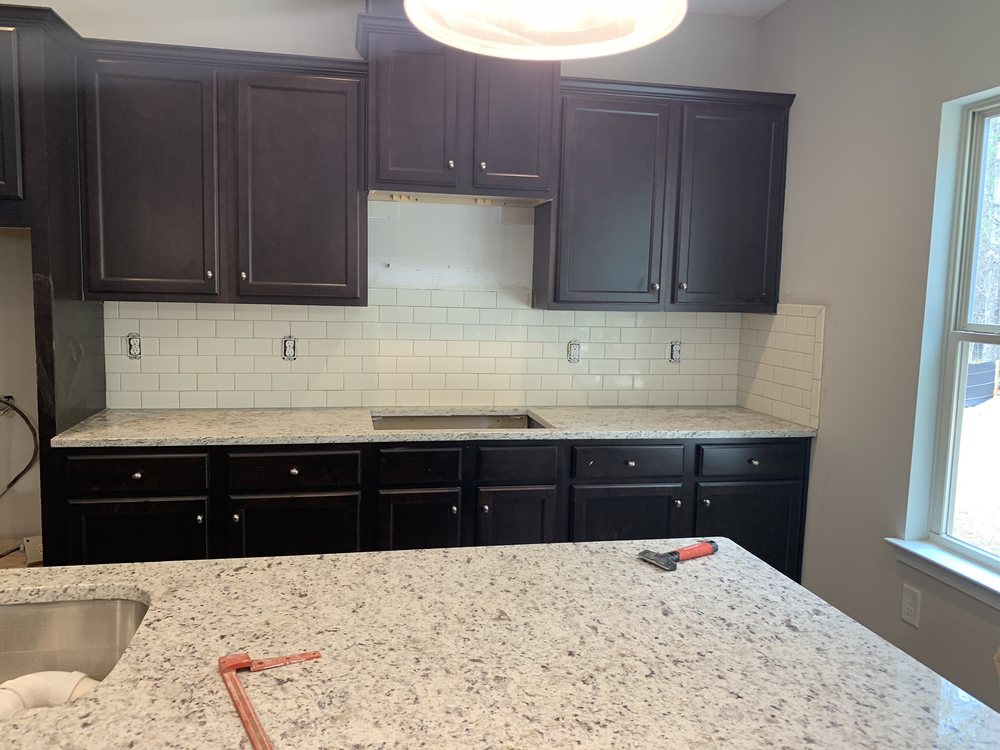 Slide of OAS Construction Roofing Concrete Floors