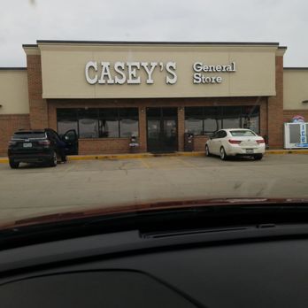 Casey's - cars parked in front of the store - Pizza Near Me - New Baden, Illinois Casey's - cars parked in front of the store - Pizza Near Me - New Baden, Illinois