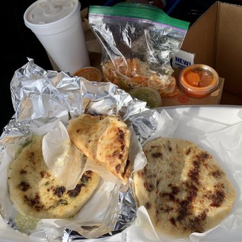 Pupuseria Cafe - Left to right, Rajas (poblano peppers and cheese), Revuelta Chicharron (pork with beans and cheese), and Asada (steak with cheese). - Salvadoran Near Me - Chicago, Illinois