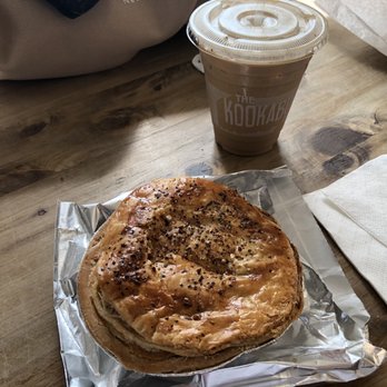 The Kookaburra - 12 oz iced Honey Badger with Oatmilk and a Corker Aussie Pie - Coffee & Tea Near Me - St. Augustine Beach, Florida
