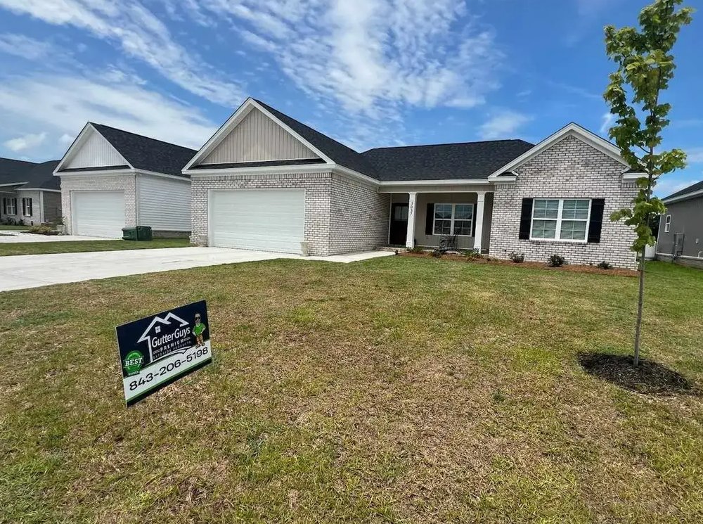 Slide of GutterGuys Premium Exterior Products