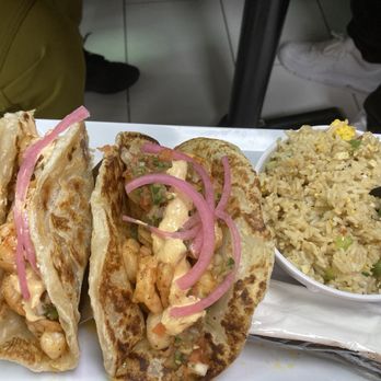Crawfish Cafe - My Blackened Shrimp Tacos with fried rice on the side. - Seafood Near Me - Houston, Texas Crawfish Cafe - My Blackened Shrimp Tacos with fried rice on the side. - Seafood Near Me - Houston, Texas