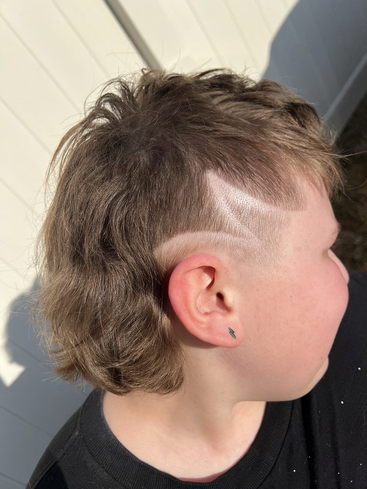 Revolution Barber Company Logo