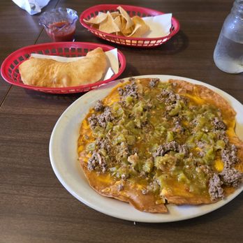 Mr. Maesta's Cafe - Green Chili Crisp with meat (ground beef) and a Sopapilla on the side. Free salsa and chips. - New American Near Me - Holbrook, Arizona