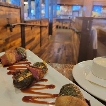 ROAM Kitchen + Bar - Bacon wrapped stuffed jalapeños - New American Near Me - Sioux Falls, South Dakota ROAM Kitchen + Bar - Bacon wrapped stuffed jalapeños - New American Near Me - Sioux Falls, South Dakota