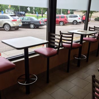 McDonald's - a view of a parking lot through a window - Burgers Near Me - Windom, Minnesota