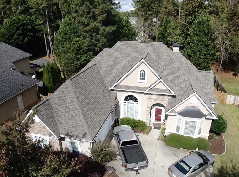 Slide of Whitaker Roofing Company