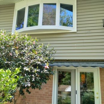 Designer Windows & Siding - Upper level: Bow window in the living room. (4 section casements)
Lower level: French Patio Door in the basement . (Legacy Series by Provia) - Windows Installation Near Me Designer Windows & Siding - Upper level: Bow window in the living room. (4 section casements)
Lower level: French Patio Door in the basement . (Legacy Series by Provia) - Windows Installation Near Me