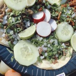 Al pastor, chorizó, lengua, and carne asada tacos Al pastor, chorizó, lengua, and carne asada tacos