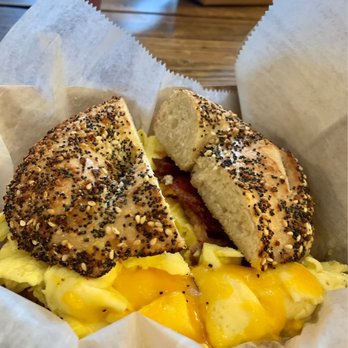Meshuggah Café - cheese, egg, and bacon on an everything bagel sandwich - Cafes Near Me - Saint Louis, Missouri