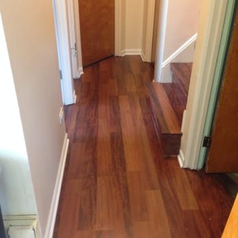 All Tiled Up Ltd - a hallway with wood floors - Flooring Near Me - Schaumburg, Illinois All Tiled Up Ltd - a hallway with wood floors - Flooring Near Me - Schaumburg, Illinois