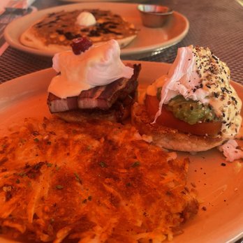 Snooze, an A.M. Eatery - Habanero Pork and Smashed Avocado Benny Duo with flat crispy hash browns - Breakfast & Brunch Near Me - Tempe, Arizona