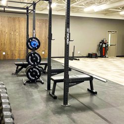 Team Rehabilitation Physical Therapy - Clinic interior with our weights and rouge