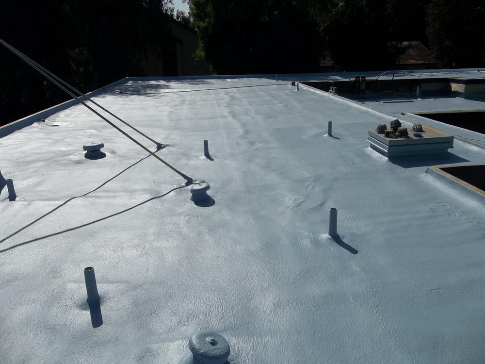 Slide of Benchmark Roofing