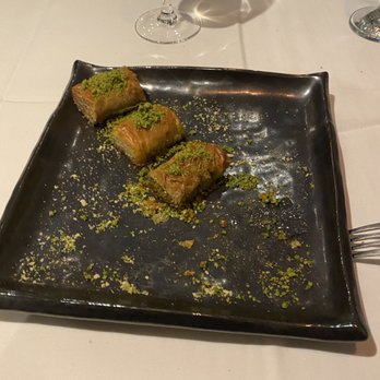 Sofra - Baklava (one already eaten ) - Turkish Near Me - London, XGL Sofra - Baklava (one already eaten ) - Turkish Near Me - London, XGL