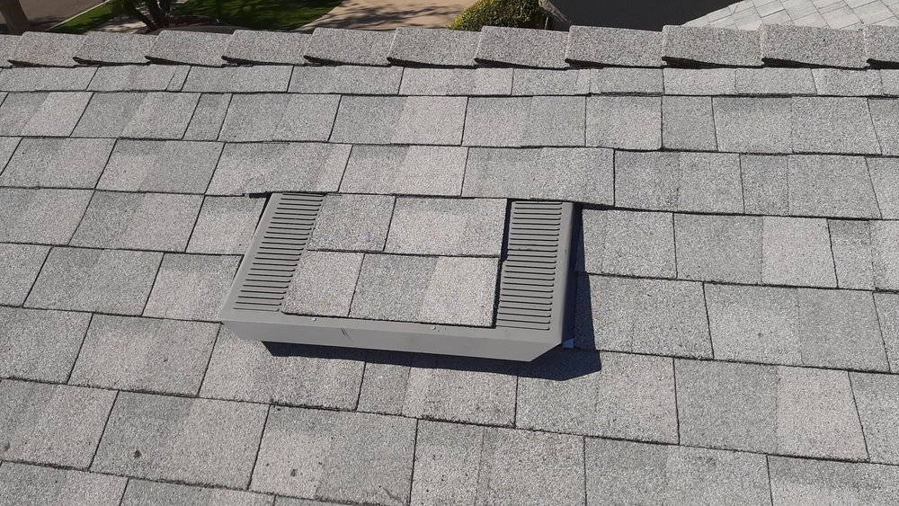 Slide of El Puma Roofing