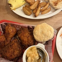 Fried chicken with Mac and cheese/ biscuit The Liberty Omelet with potatoe wedges/ biscuit
