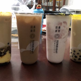 Sunright Tea Studio - Sunnyvale - (L to R: Brown sugar boba milk + creme brulee, Ceylon milk tea (almond milk), strawberry frostie, and creme Brulee milk (oat milk) - Bubble Tea Near Me - Sunnyvale, California Sunright Tea Studio - Sunnyvale - (L to R: Brown sugar boba milk + creme brulee, Ceylon milk tea (almond milk), strawberry frostie, and creme Brulee milk (oat milk) - Bubble Tea Near Me - Sunnyvale, California
