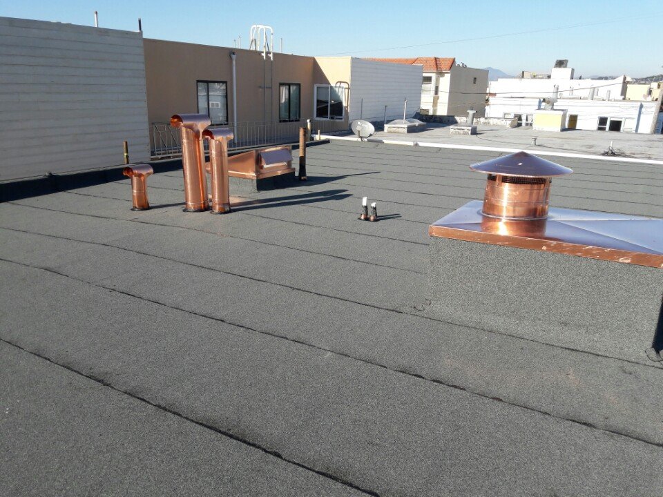 Slide of Westech Roofing Company