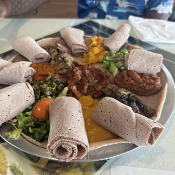 Addis Ethiopian - Veggie combo and meat combo - family style - Ethiopian Near Me - San Diego, California Addis Ethiopian - Veggie combo and meat combo - family style - Ethiopian Near Me - San Diego, California