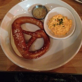 Surly Brewing - Pretzel with pimento cheese and spicy ale mustard - Breweries Near Me - Minneapolis, Minnesota Surly Brewing - Pretzel with pimento cheese and spicy ale mustard - Breweries Near Me - Minneapolis, Minnesota