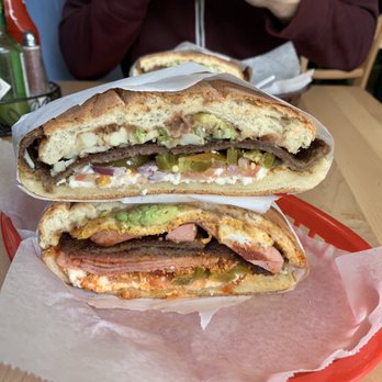 Tortas Boos Voni - Torta cubana on bottom, milanesa and quesillo on top. - Mexican Near Me - San Francisco, California Tortas Boos Voni - Torta cubana on bottom, milanesa and quesillo on top. - Mexican Near Me - San Francisco, California